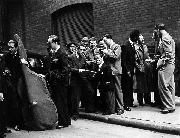 Musicians in a London street, 1940s