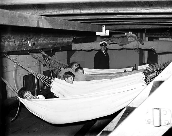 Sea Cadets in hammocks on a barge, Walton, Essex