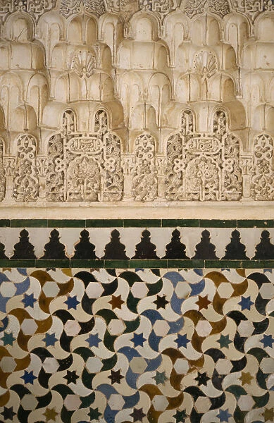 20079924. SPAIN Andalucia Granada The Alhambra. Detail of stucco and tiles Andalusia