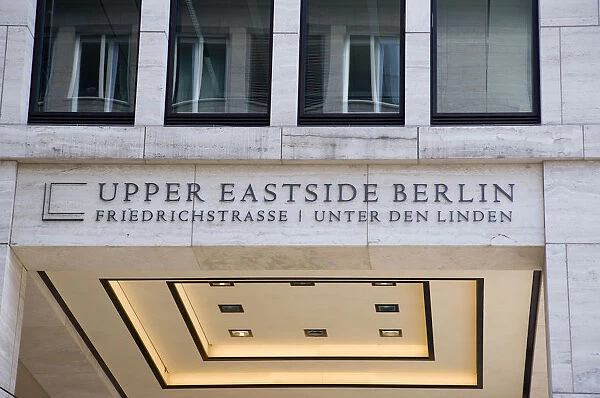 Germany, Berlin, Mitte, New York influenced sign reading Upper Eastside Berlin