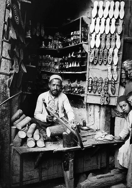 DAMASCUS: SLIPPER MAKER. An inlaid slipper maker in his shop in Damascus, Syria