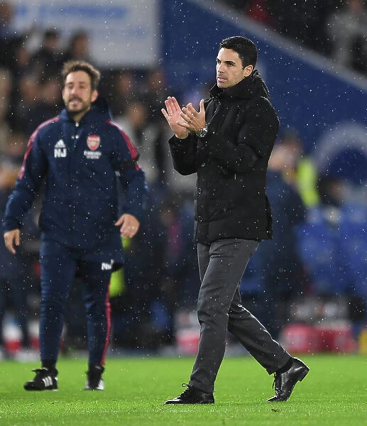 Arsenal Manager Mikel Arteta Celebrates with Fans after Brighton Victory, Premier League 2022-23