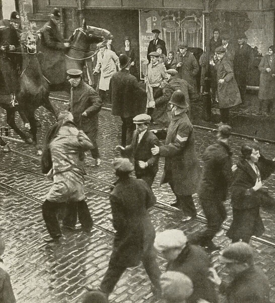 Cotton mill strike in 1932 during the Great Depression, with police clearing the streets of demonstrators (b  /  w photo)