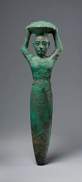 Foundation figure of king Shulgi of Ur, carrying a basket, c. 2094-2047 BC (copper)