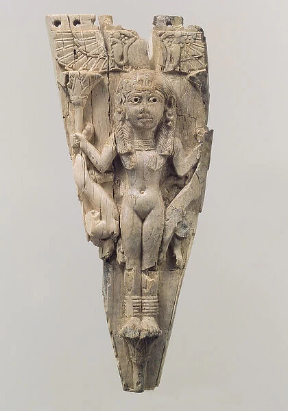 Horse frontlet carved in relief with a female figure flanked by lions, c