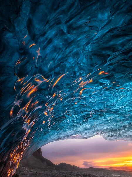 Flames Dancing in the Ice, blue ice cave in Iceland