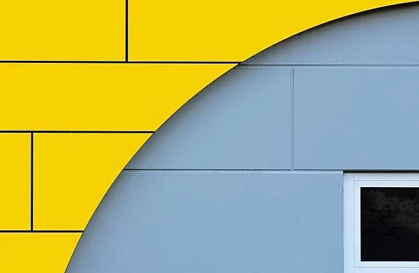 Graphic facade with an arch