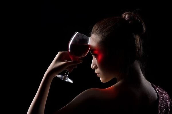 A lady with red wine