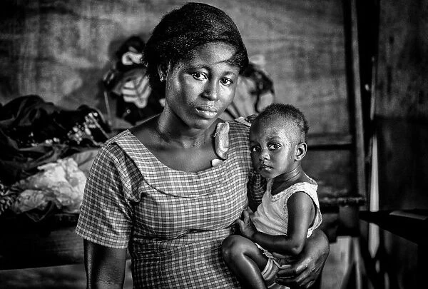 Mother and her child in a sewing company in Ghana.