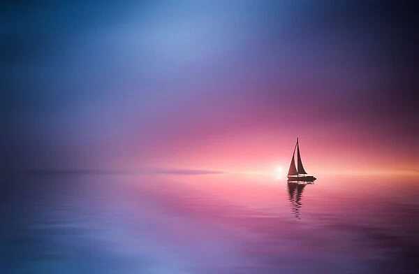 Sailing across the lake toward the sunset