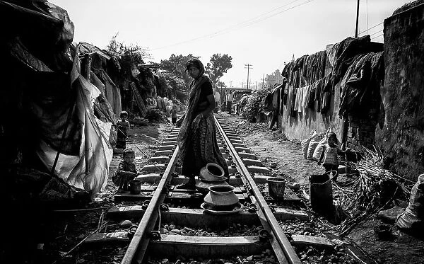 A scene of life on the train tracks - Bangladesh