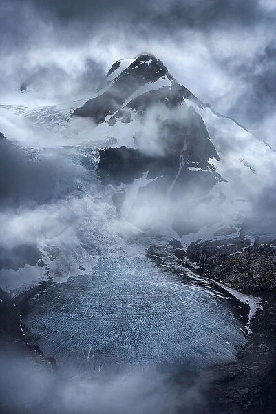 Unbroken. The west peak of Mt. Jacobsen enveloped with incredible atmospheric