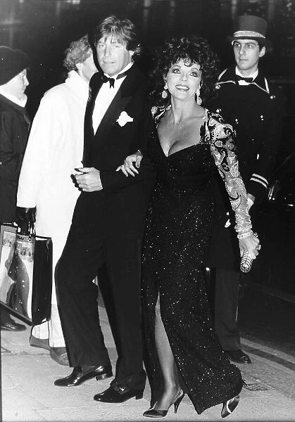 Joan Collins and boyfriend Bill Wiggins arrive at the Cafe Royale November