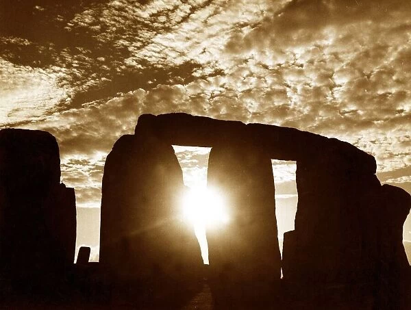 Sunset over Stonehenge Wiltshire - Stone Features Sky Clouds Sun