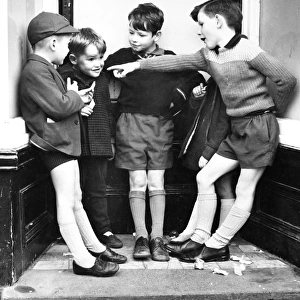 Boys in doorway on a Balham street, SW London