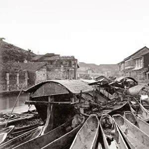 Canal scene with boats, probably Manila, Philippines