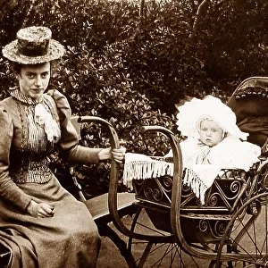 Governess or nanny with baby in pram Victorian period