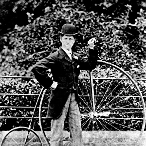 Proud owner and his penny farthing bicycle