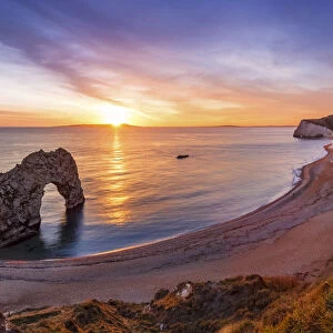 A winters sunset over Durdle Door on the Jurassic Coast, UNESCO World Heritage Site