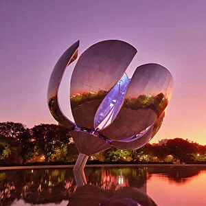 The "Floralis Generica" monument at twilight, Recoleta, Buenos Aires, Argentina. It was created in 2002 by artist Eduardo Catalano