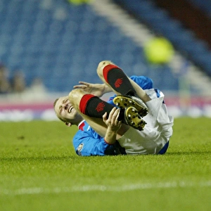 Rangers Triumph Over Dunfermline: Stephen Hughes Suffers Injury (23/03/04)