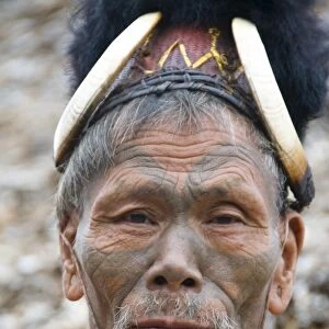 Shanghah Chingnyu Village, Nagaland, northeast India, old tattoed man dressed in