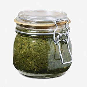 Glass jar of green chilli sauce (skhug)