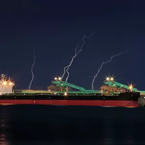 Stormy dramatic sky with lightning breaking over a ship at Port Lincoln. Eyre Peninsula. South Australia