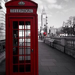 Red phone booth in central London with Big Ben in the background