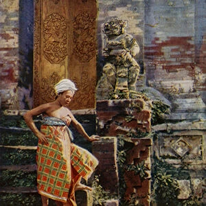 Balinese girls talking among ruins (colour photo)