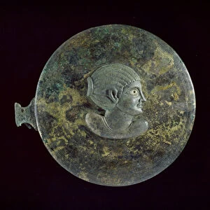 Cast bronze mirror-cover with Hellenistic bust of a woman in relief