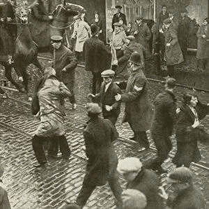 Cotton mill strike in 1932 during the Great Depression, with police clearing the streets of demonstrators (b / w photo)