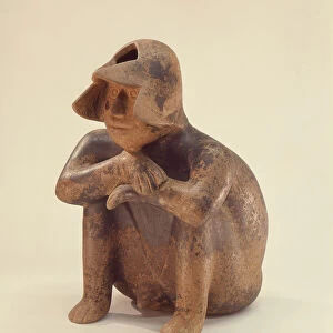 Seated man, Colima Culture (ceramic)