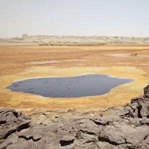Dallol geothermal area, 1926 explosion crater by Black Mountain, Danakil Depression