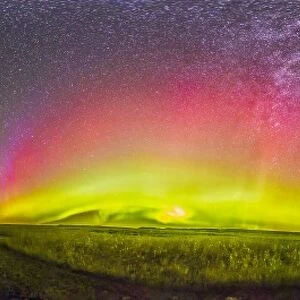 Panorama of an aurora and the Milky Way at a ranch in Canada