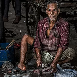 Fishmonger in the streets of Bangladesh