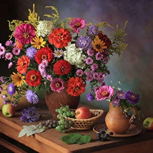 Still life with autumn flowers and fruits