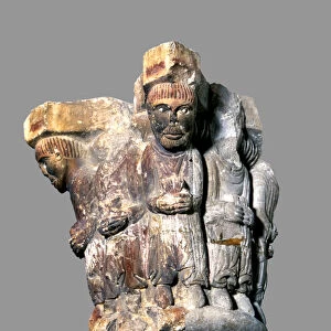 Capital with polychromed stone sculpture representing the abbot of Camprodon with