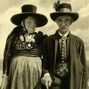Couple in traditional dress, Sankt Lambrecht, Styria, Austria, c1935. Creator: Unknown