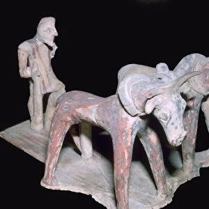 Greek terracotta of a man ploughing, 6th century BC