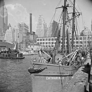 The New England fishing boat, the Catherine C, docked at the Fulton fish market, New York, 1943. Creator: Gordon Parks