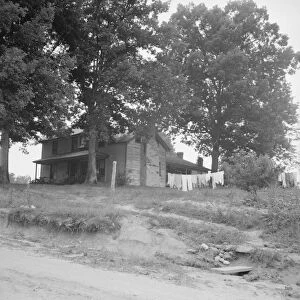 The one-and-a-half story part of this house was... Person County, North Carolina, 1939. Creator: Dorothea Lange