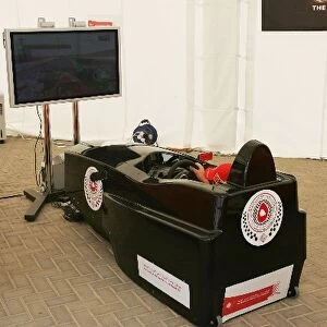 Formula One World Championship: Circuit atmosphere in the public area with F1 simulator game