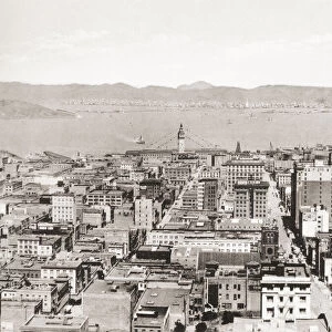 Birds eye view of San Francisco and the Bay from the Fairmont Hotel, showing the ferry building and, on the opposite shore, the cities of Oakland, Berkeley and Alameda, Mt. Diablo is seen in the distance. California, United States of America, c. 1915. From Wonderful California, published 1915