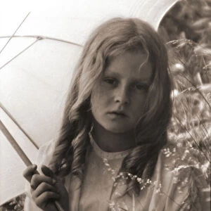 Portrait of a young girl under an umbrella, Victorian or Edwardian era