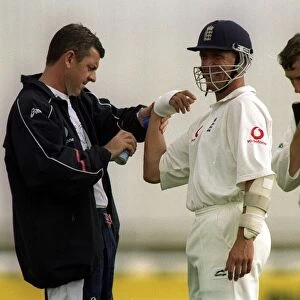 Alec Stewart Gets Treatment From Physiotherapist Wayne Morton After Hurting His Arm In