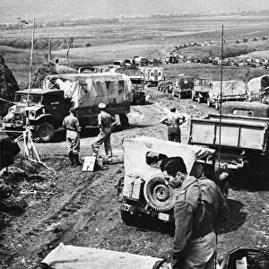 Canadians in Italy. Army supply vehicles jam the road leading to the front through
