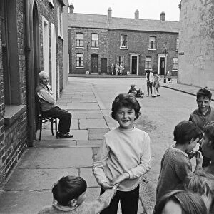 Children seen here playing in the back streets of Belfast. Circa 1966