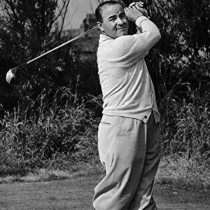 Gene Farayer golfer playing golf shot from tee swing wood club