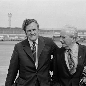 Leeds United manager Don Revie with director Bob Roberts as the team return to Manchester